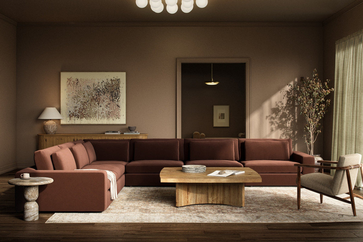 a living room with a large couch and a coffee table