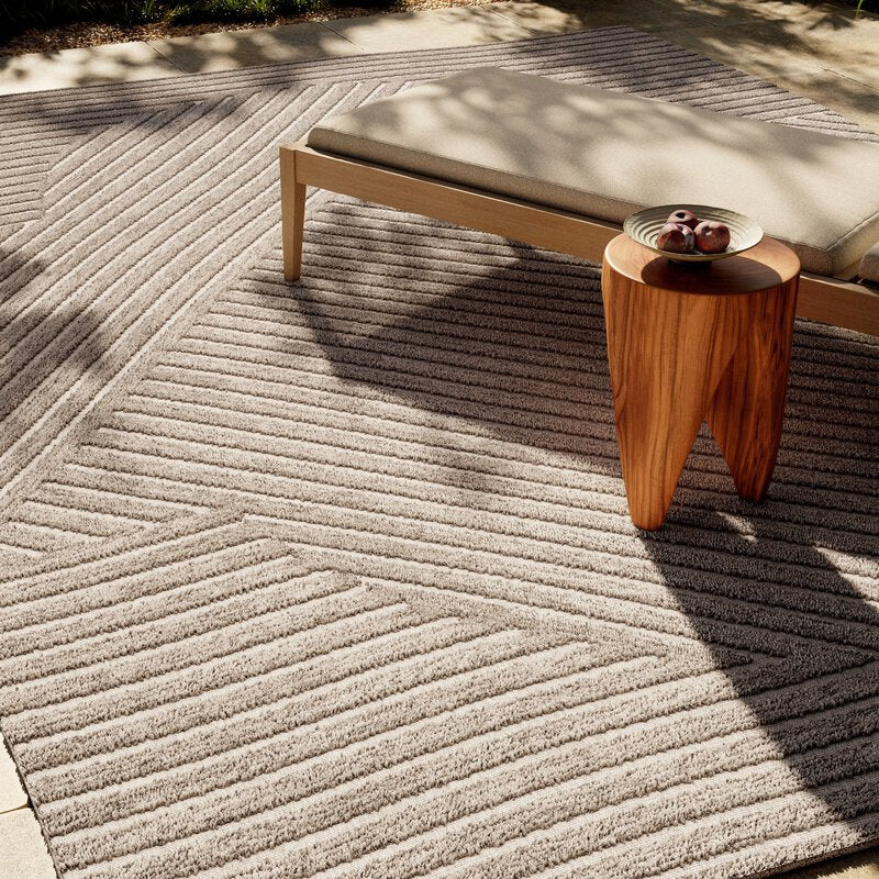 a bench on a rug