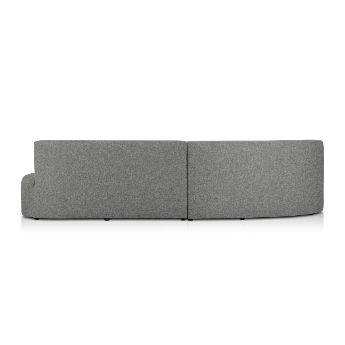 a grey couch with curved back