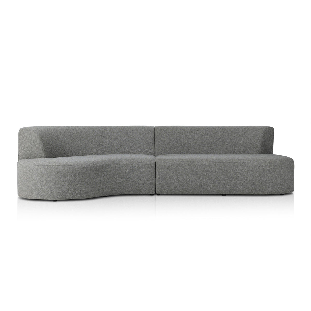 a grey couch with curved back