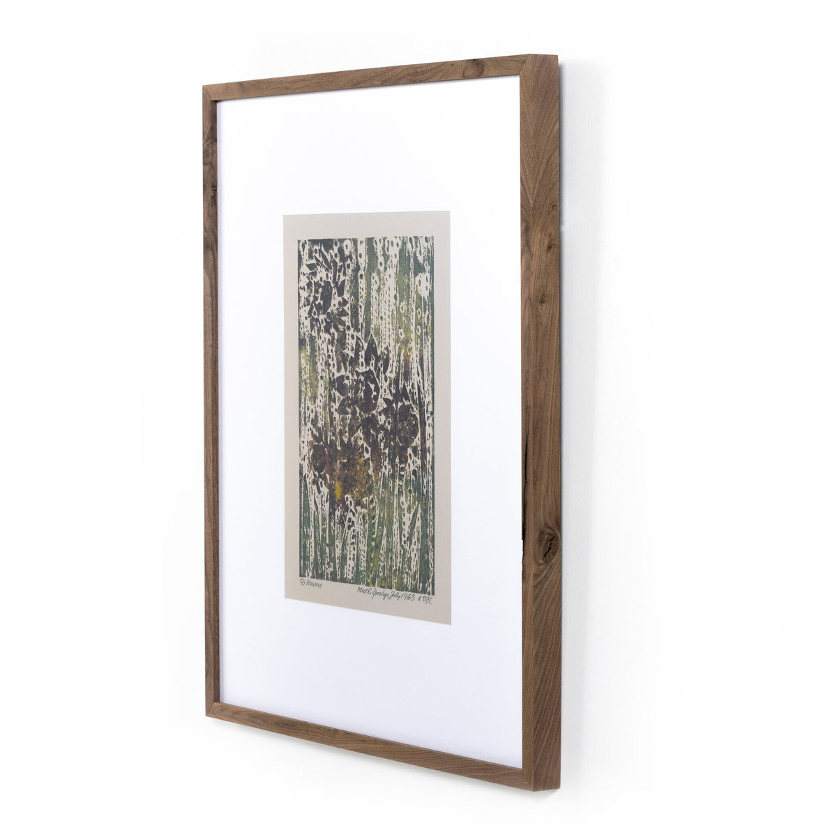 a picture frame with a picture on a wall