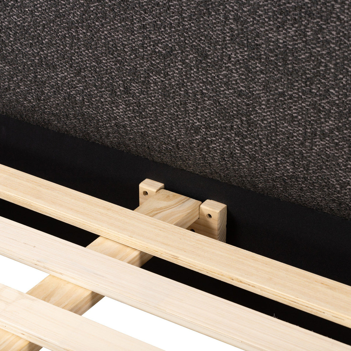 a wooden slats on a bed frame