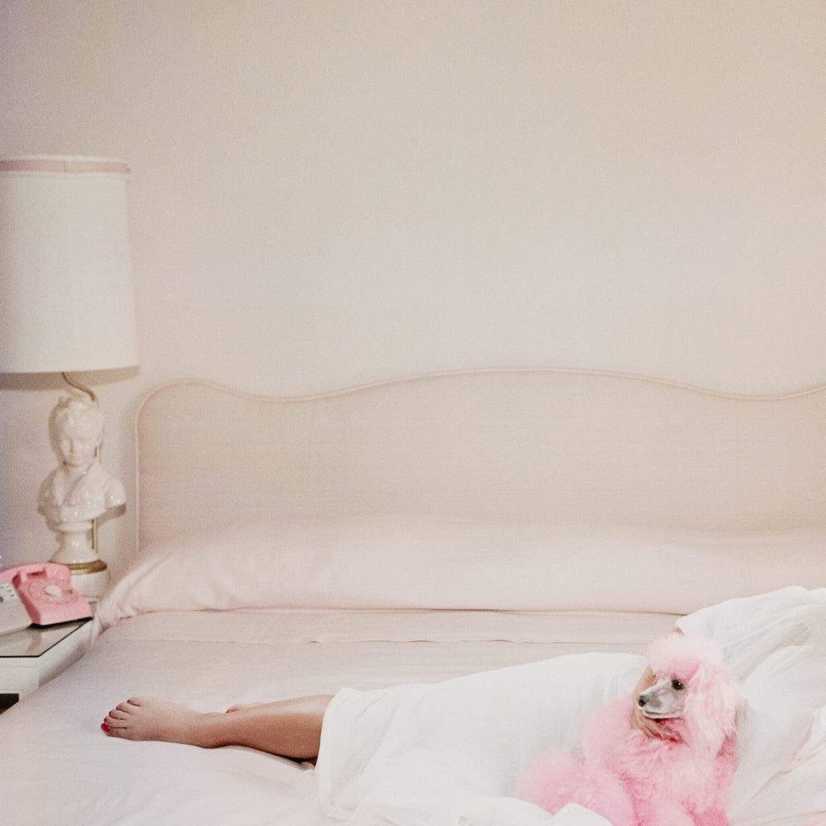 Joan Collins Relaxes By Slim Aarons