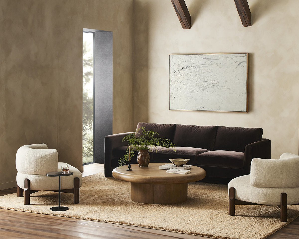 a living room with a couch and a coffee table