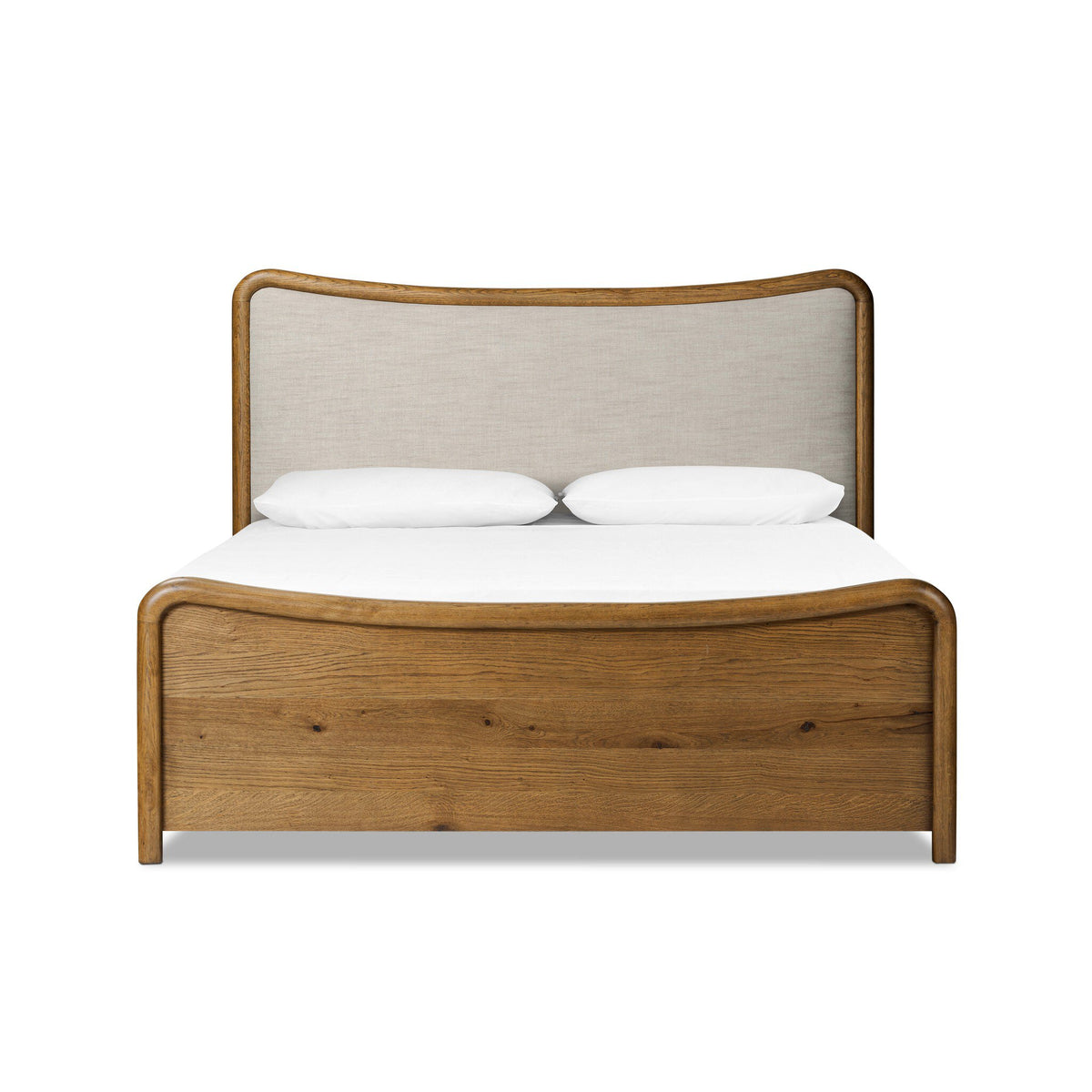 a bed with a white pillow