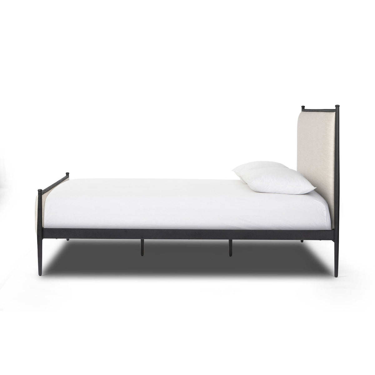 a bed with a white sheet on it