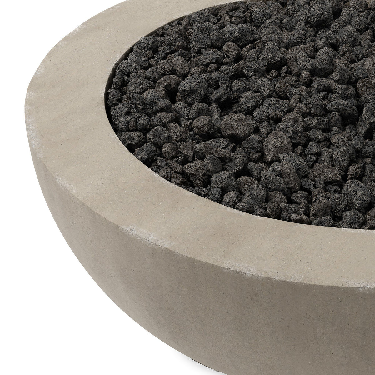 a round concrete bowl with black pebbles