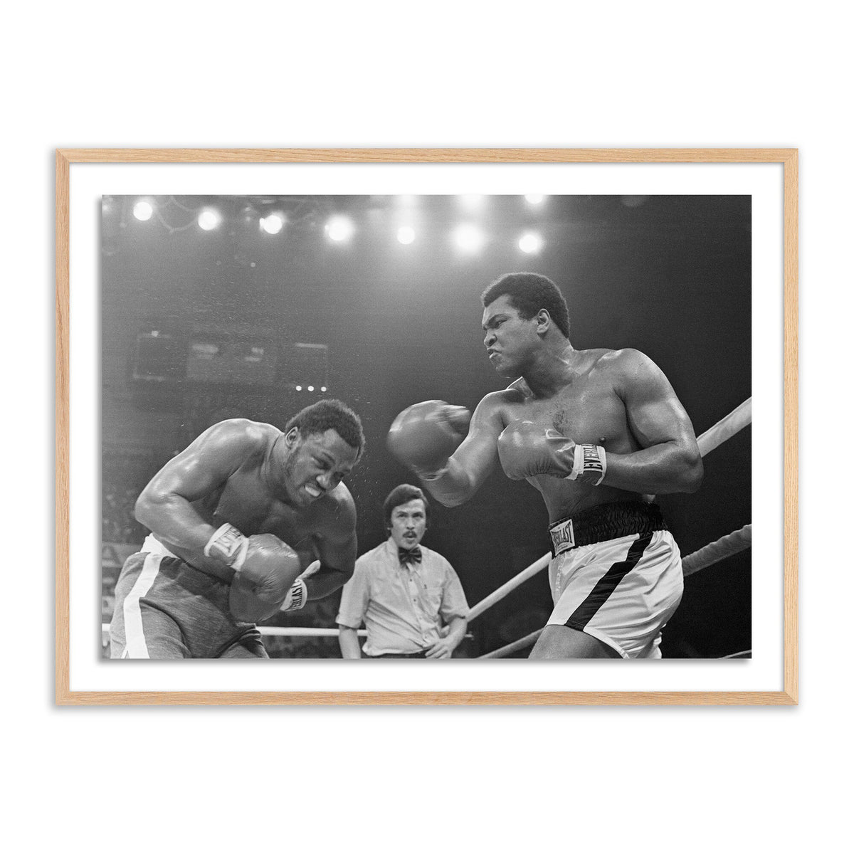 Muhammad Ali Punching Joe Frazier By Getty Images