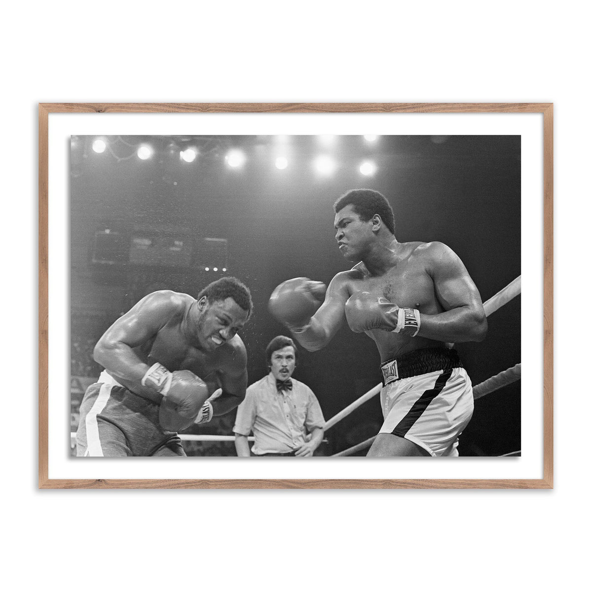 Muhammad Ali Punching Joe Frazier By Getty Images