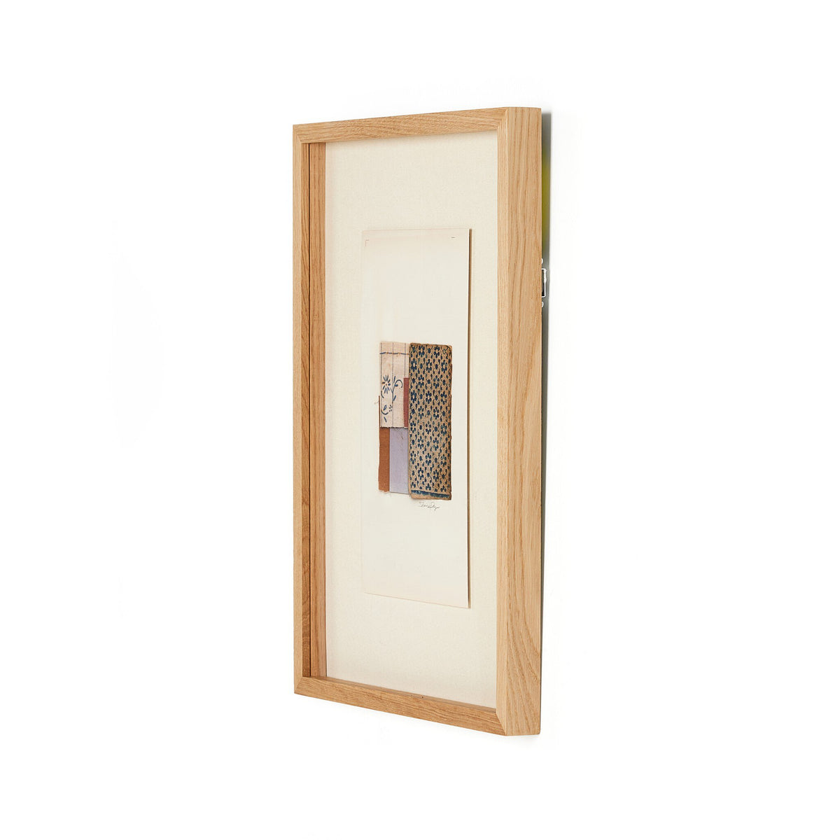 a wood frame with a piece of art on it