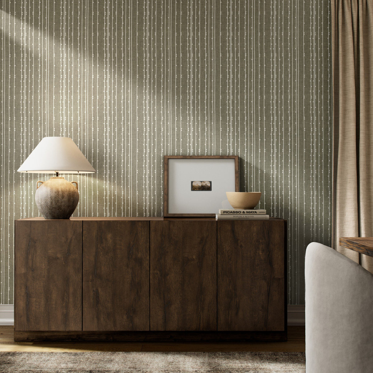 a room with a cabinet and a lamp