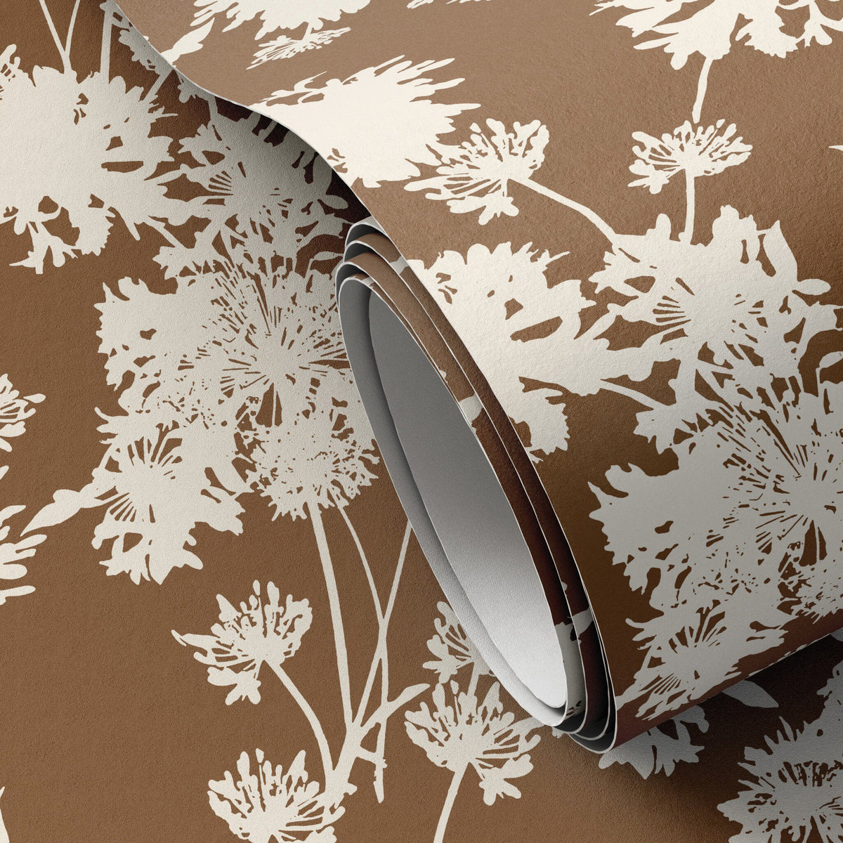 a roll of brown and white wallpaper