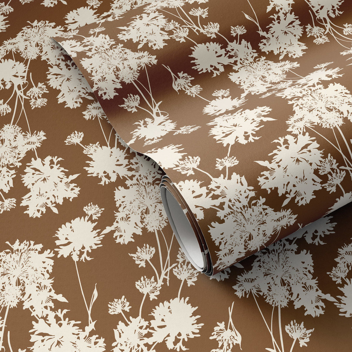 a brown and white floral wallpaper