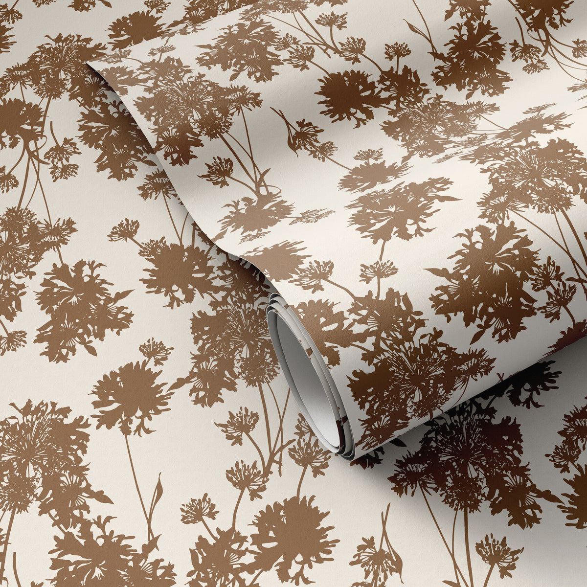 a roll of brown and white wallpaper