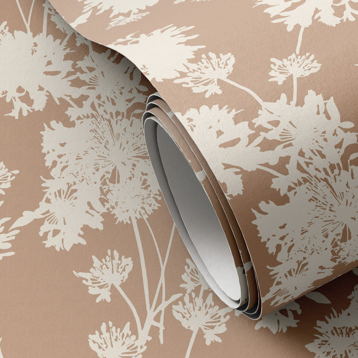 a roll of wallpaper with white flowers on it