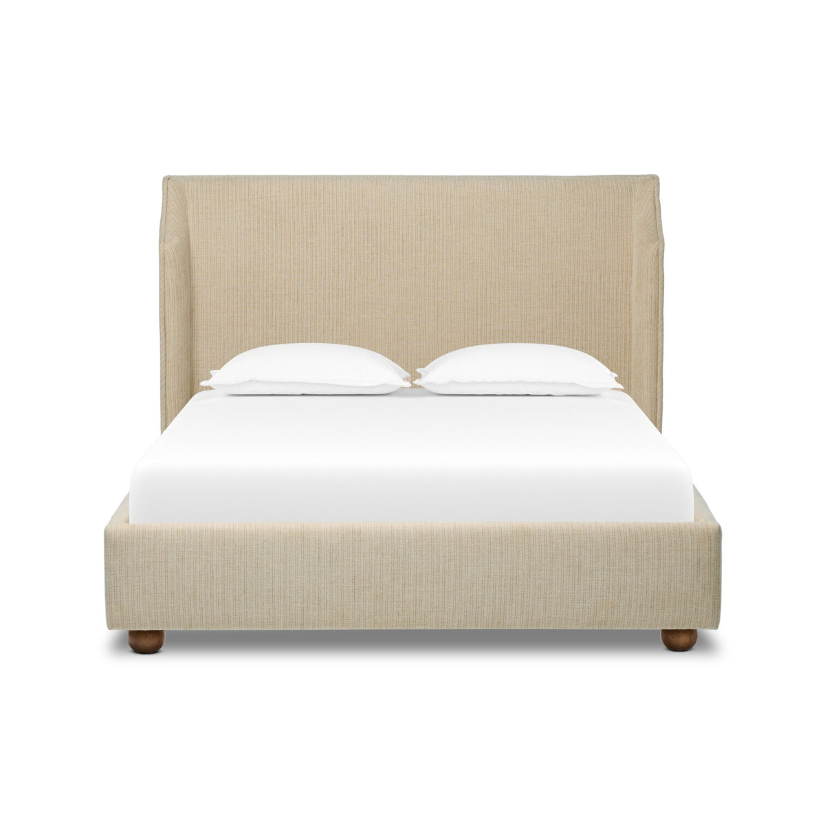 a bed with a white sheet and pillows