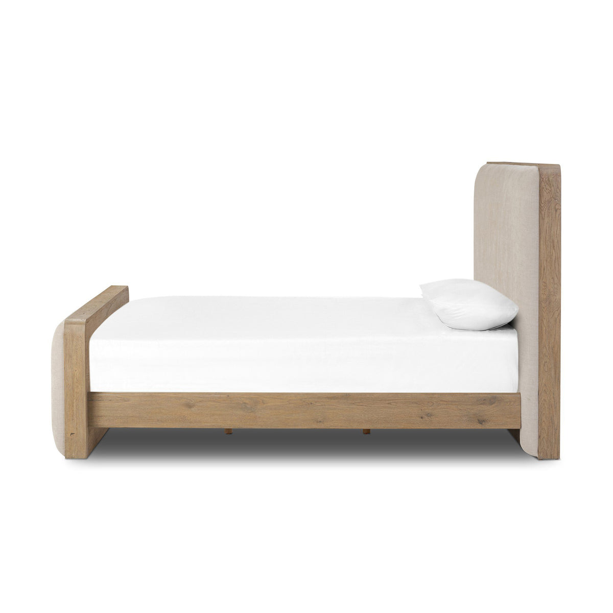a bed with a white sheet