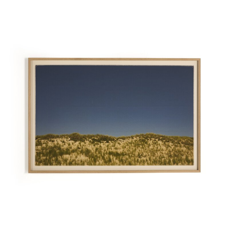 a picture frame with a blue sky