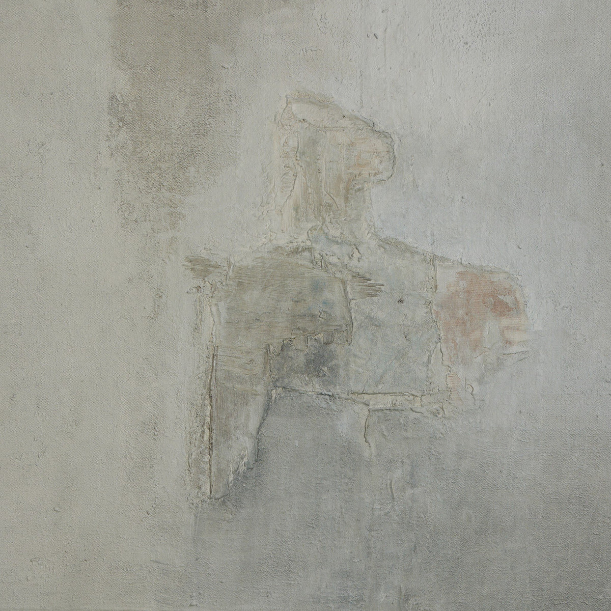 a grey and white wall with a pattern