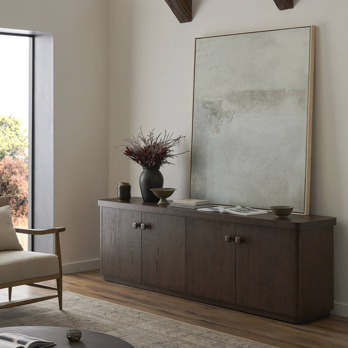 a large painting on a cabinet