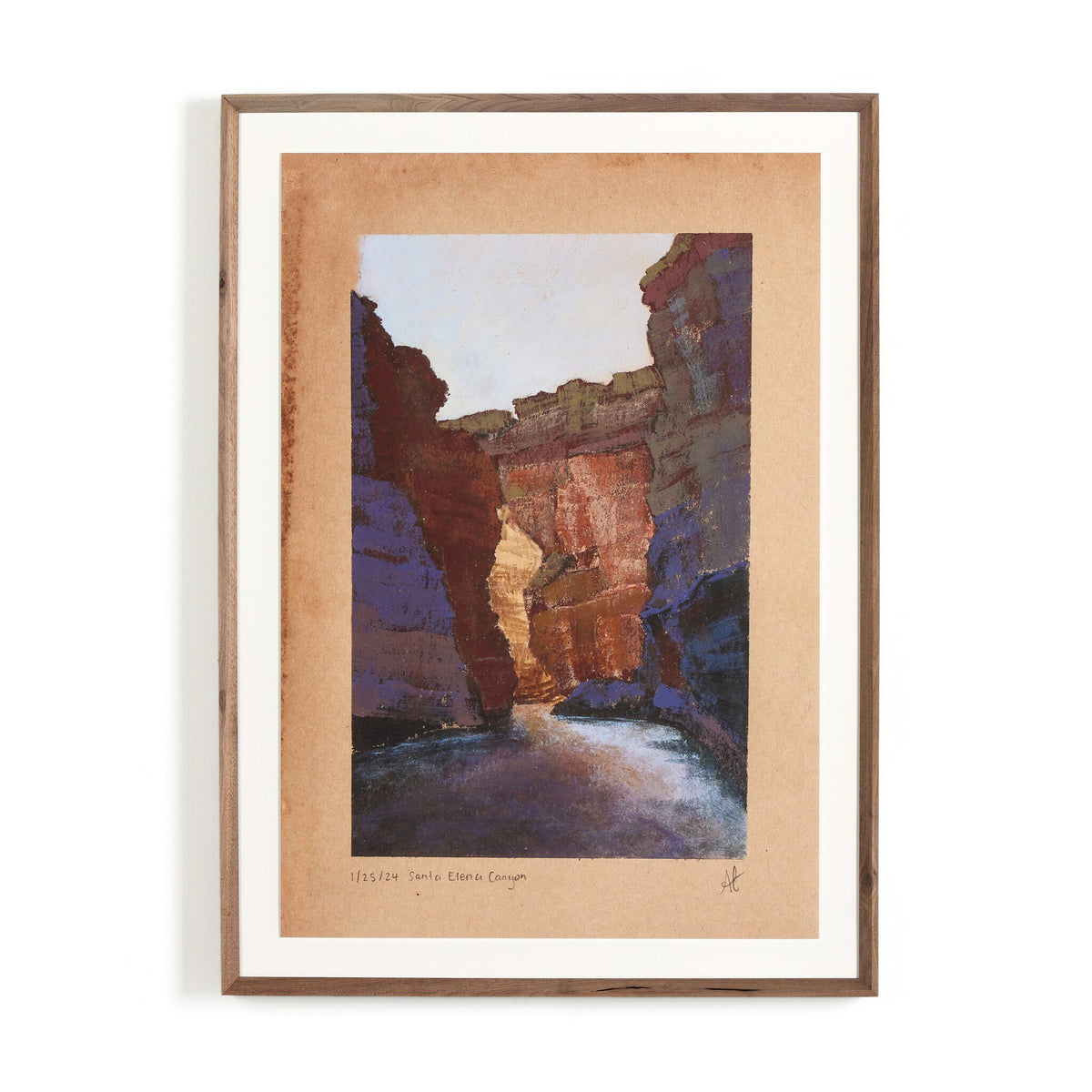 a framed picture of a canyon