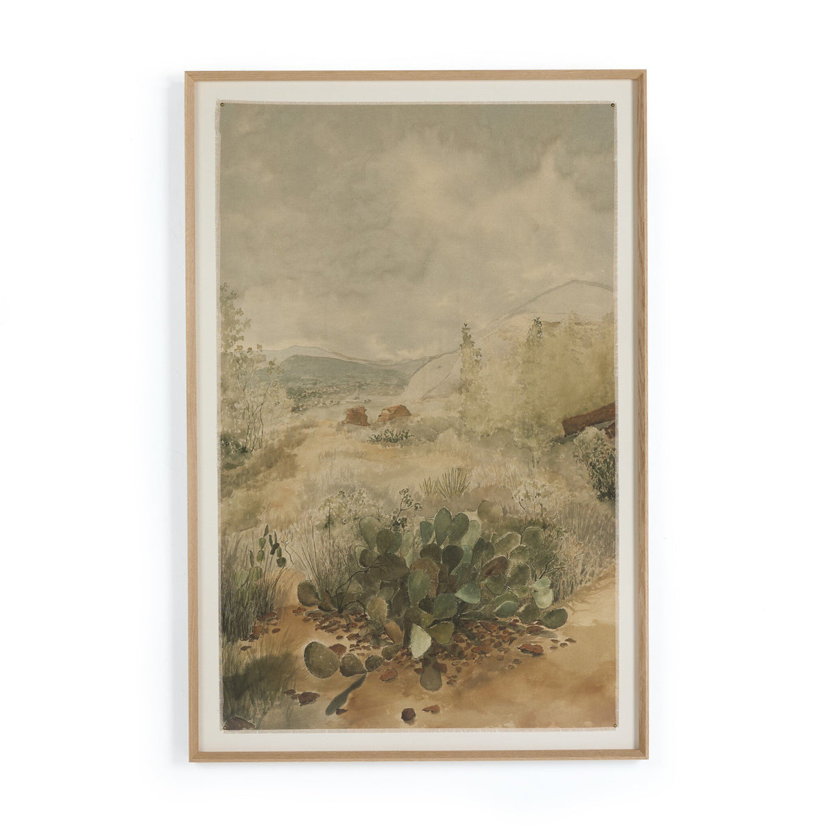 a framed painting of a landscape