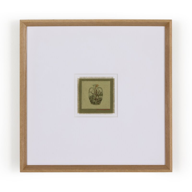 a framed picture of a flower