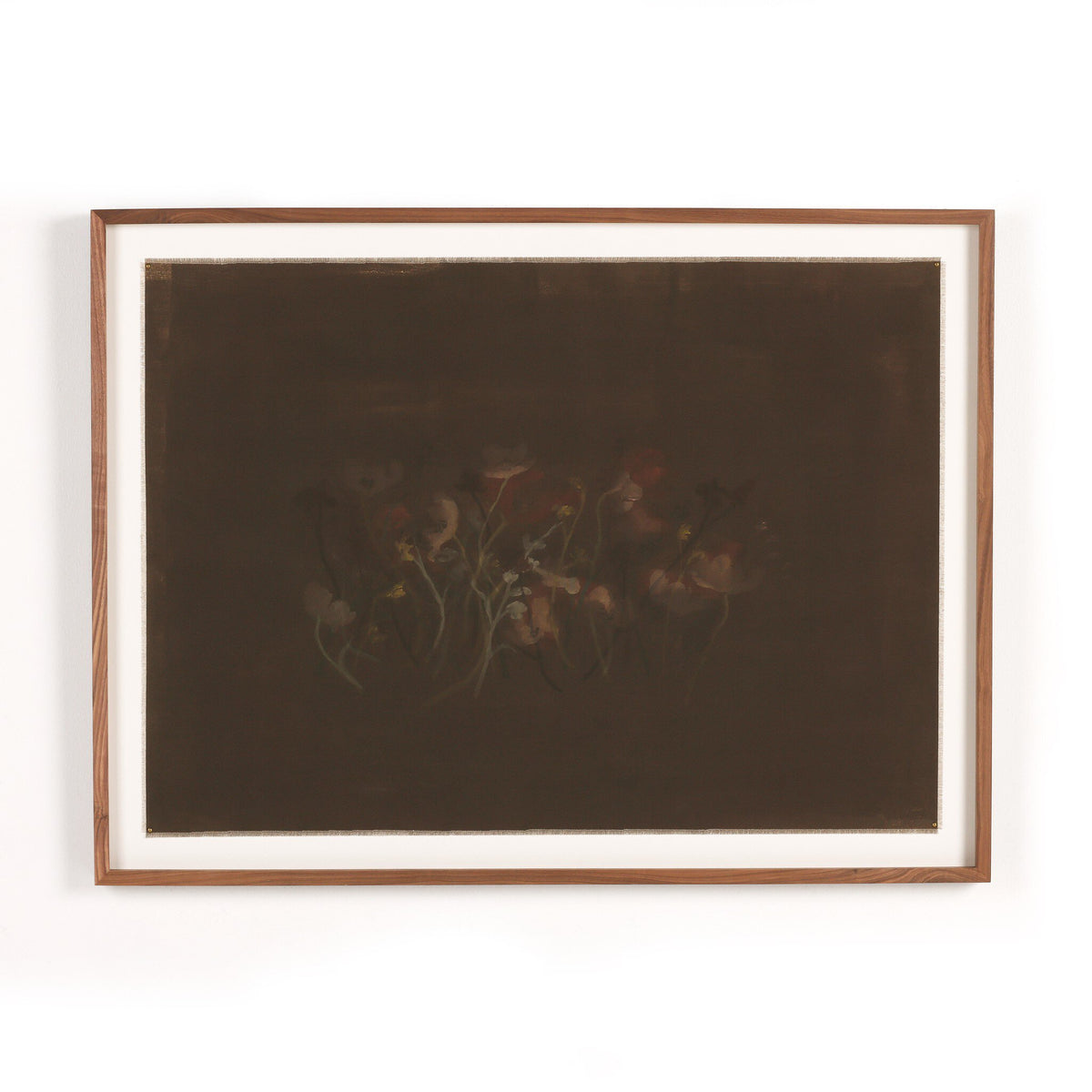 a framed picture of flowers