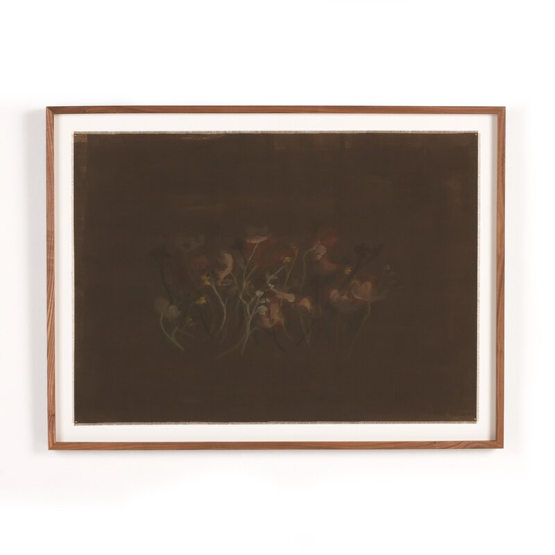 a framed picture of flowers