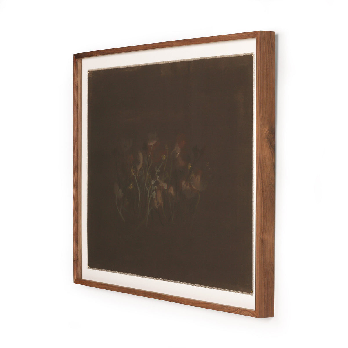a framed picture of flowers