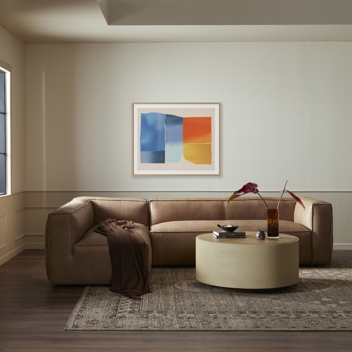 a living room with a couch and a coffee table