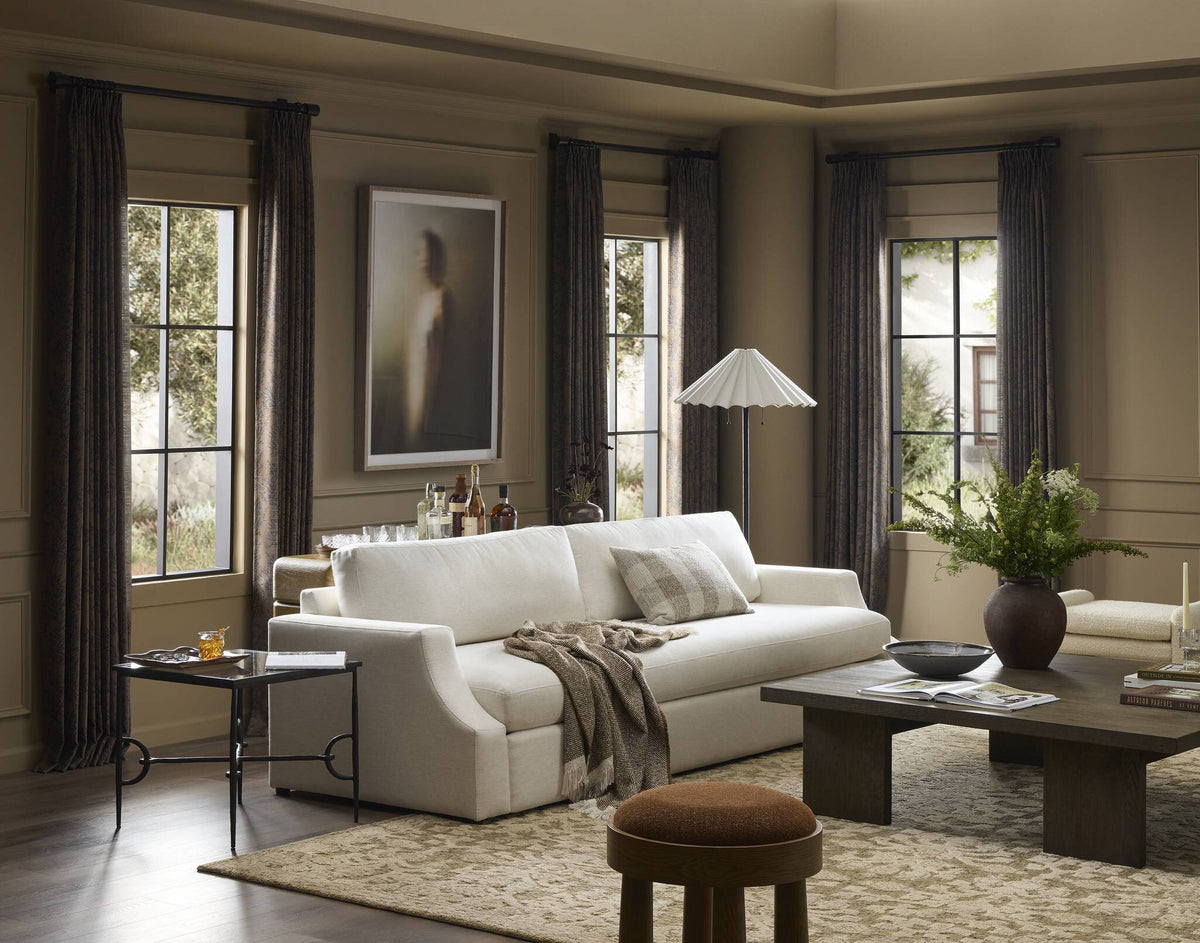 a living room with a couch and coffee table