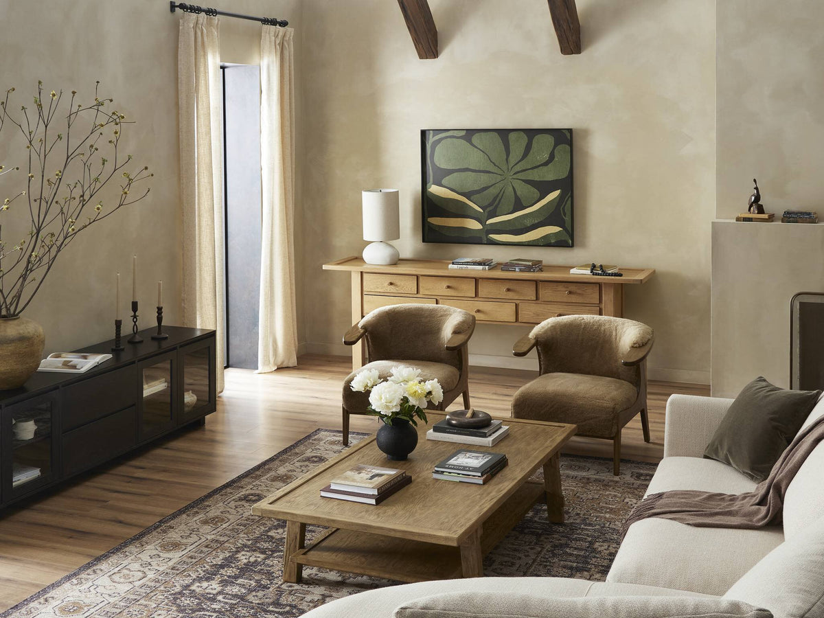 a living room with a couch and a coffee table