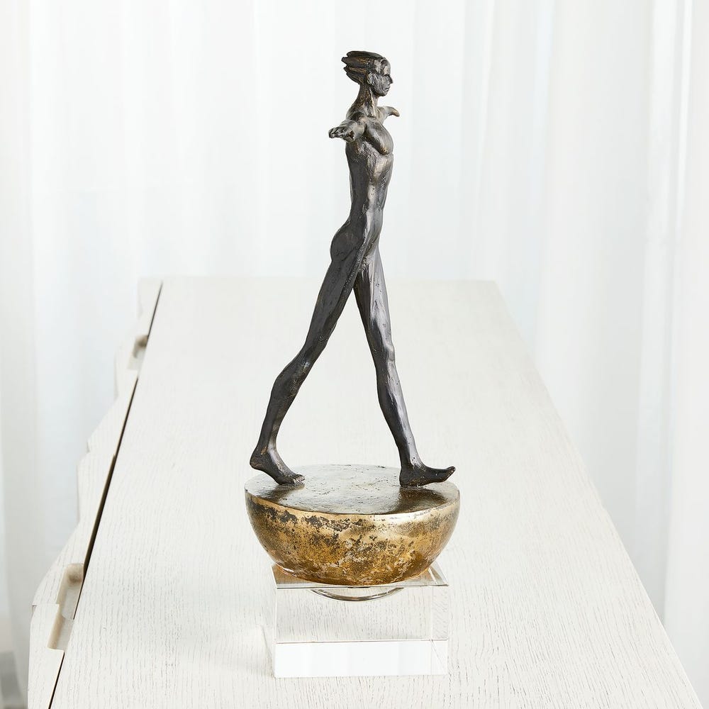 Man Finding Balance Sculpture