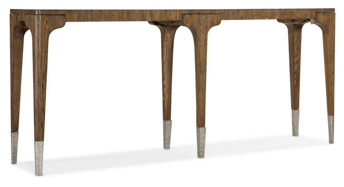 a table with legs and a wooden top