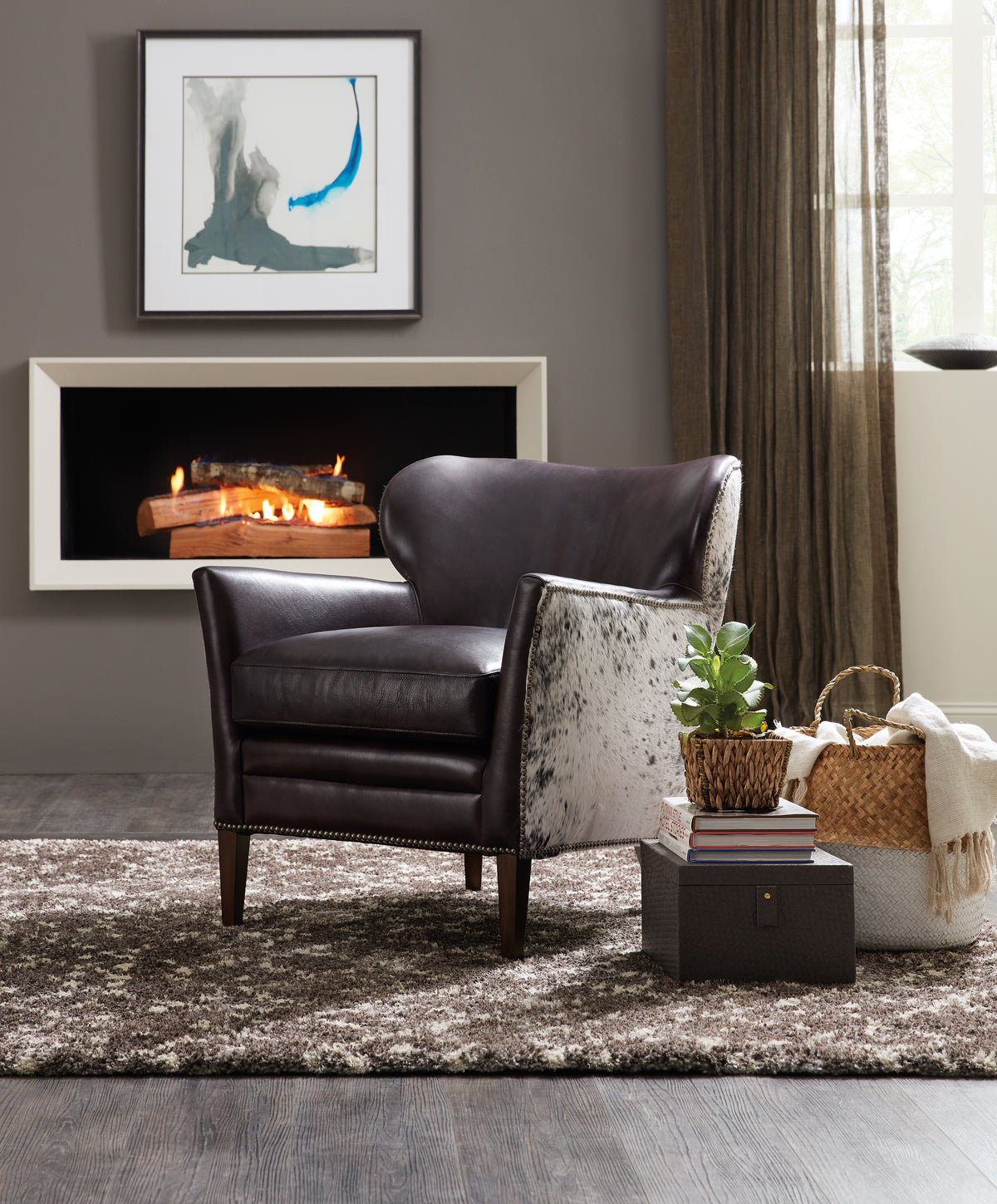 a chair in a room with a fireplace