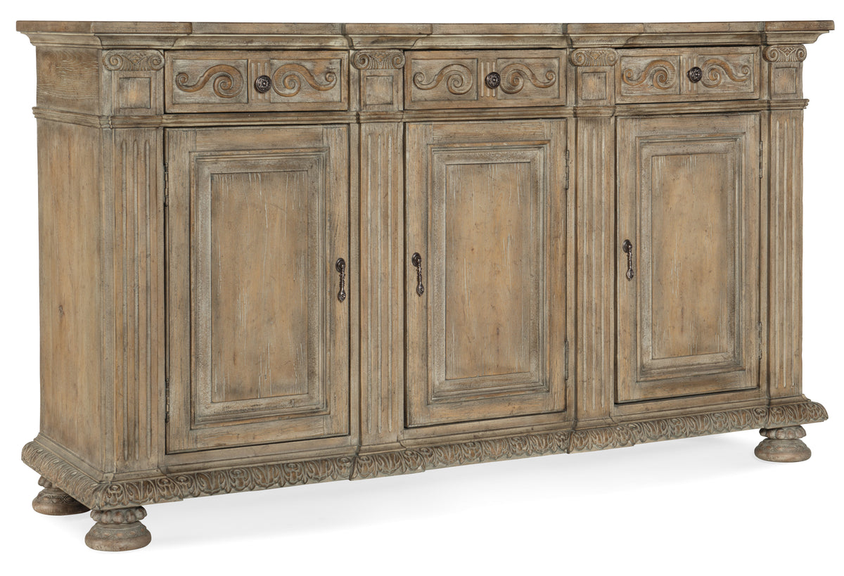 a wooden cabinet with a carved design