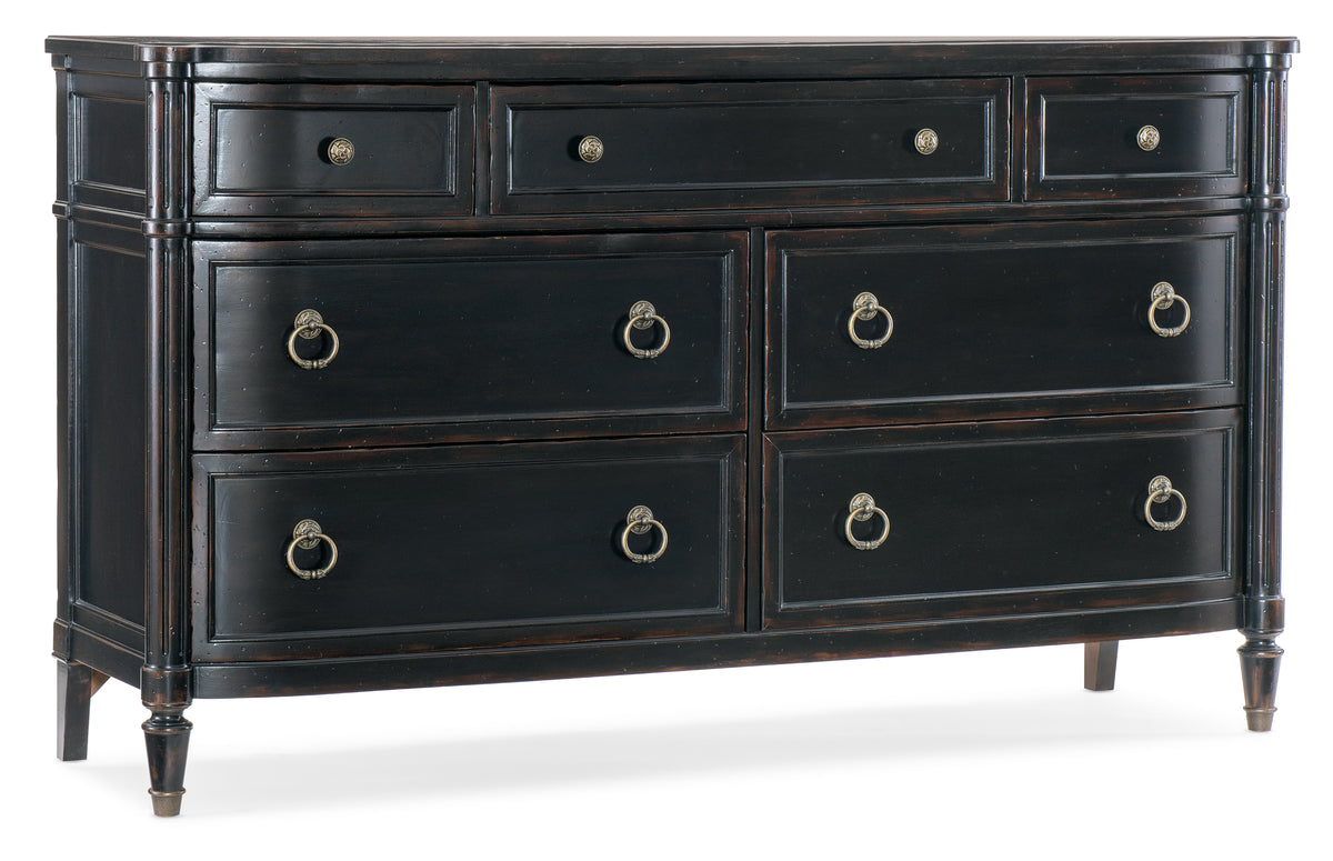 a black dresser with gold handles