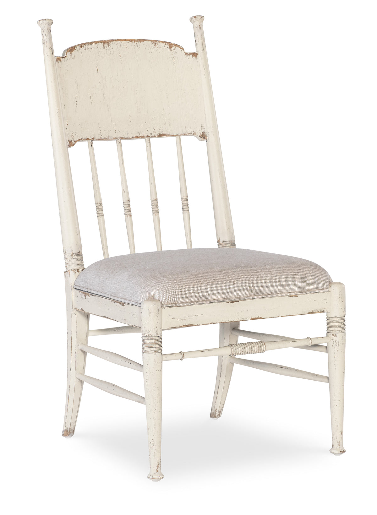 a white chair with a cushion