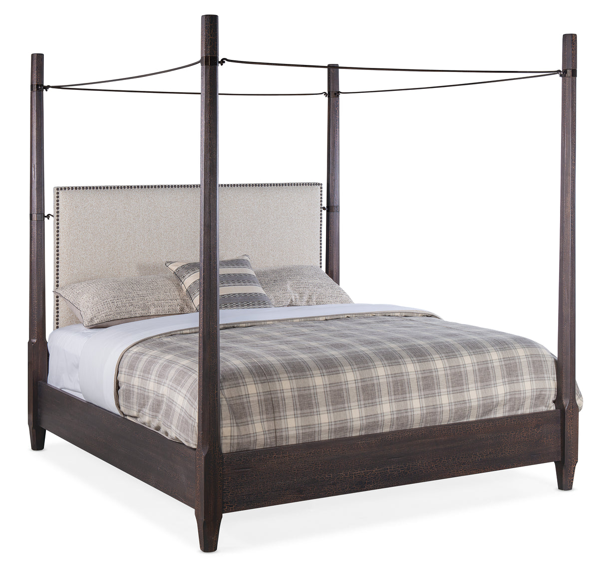 a bed with a four poster bed
