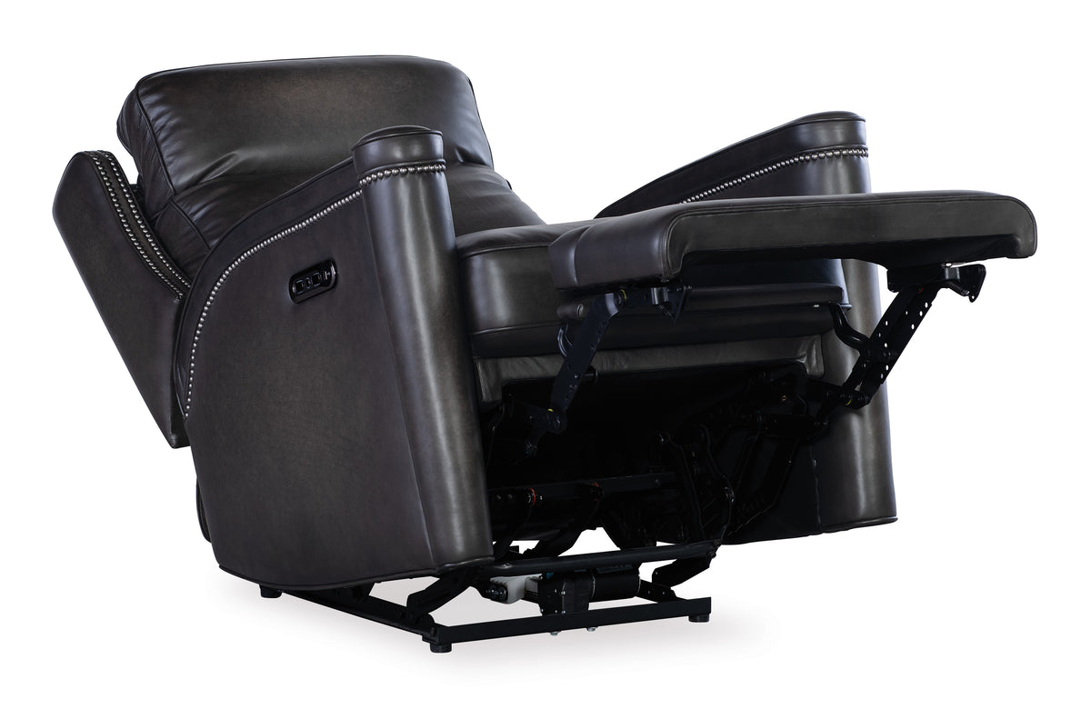 a black recliner with white stitching