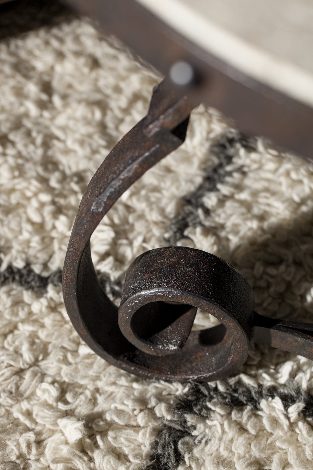 a metal object on a carpet