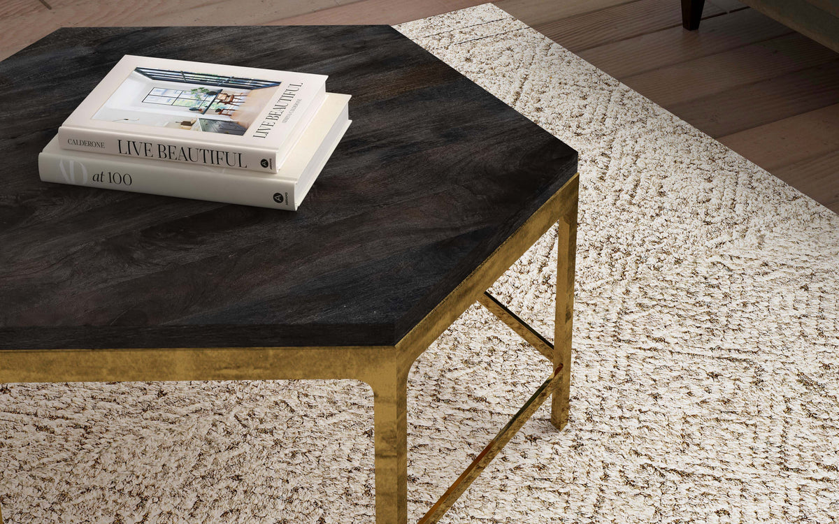 a coffee table with books on it