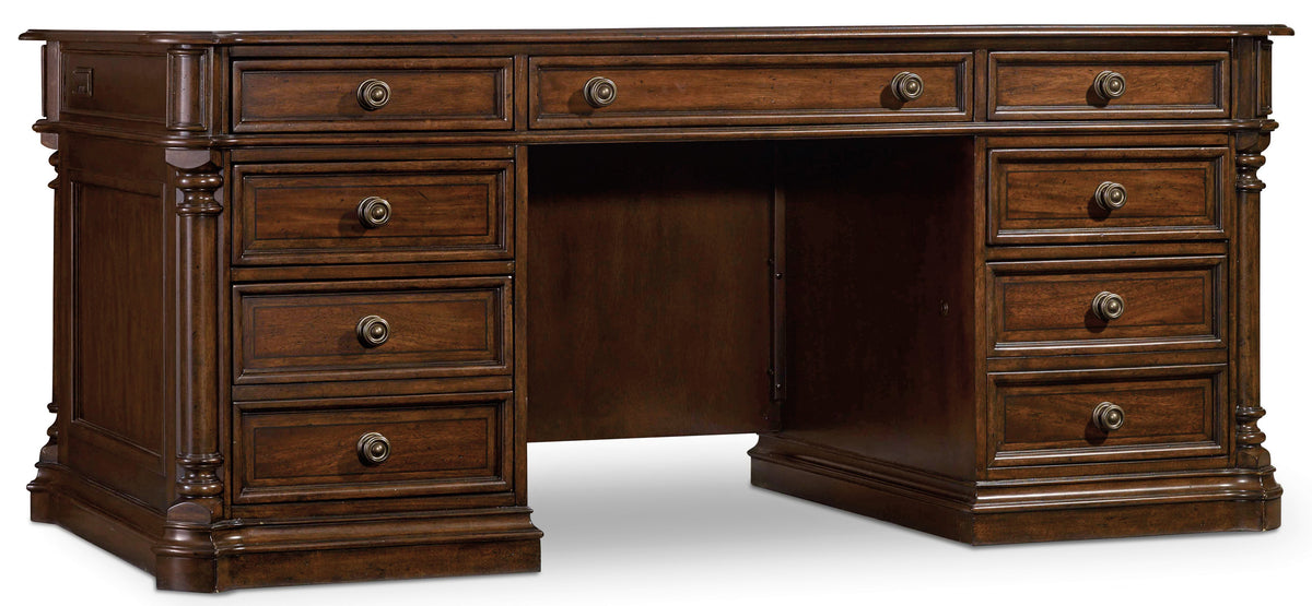 a wooden desk with drawers
