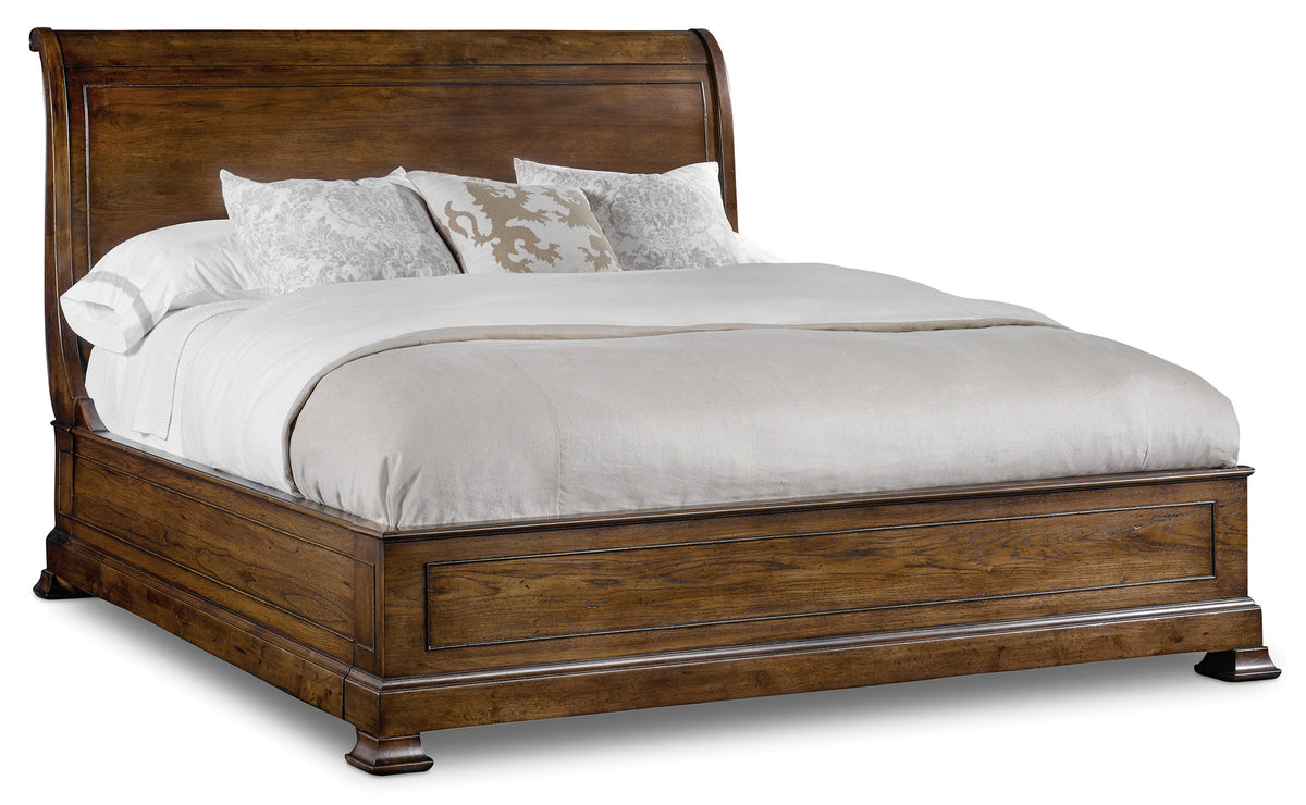 a bed with a white cover