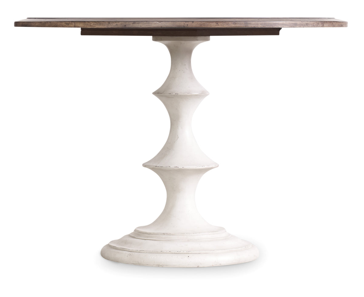a white table with a wooden top