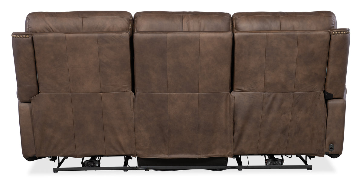 a brown leather couch back
