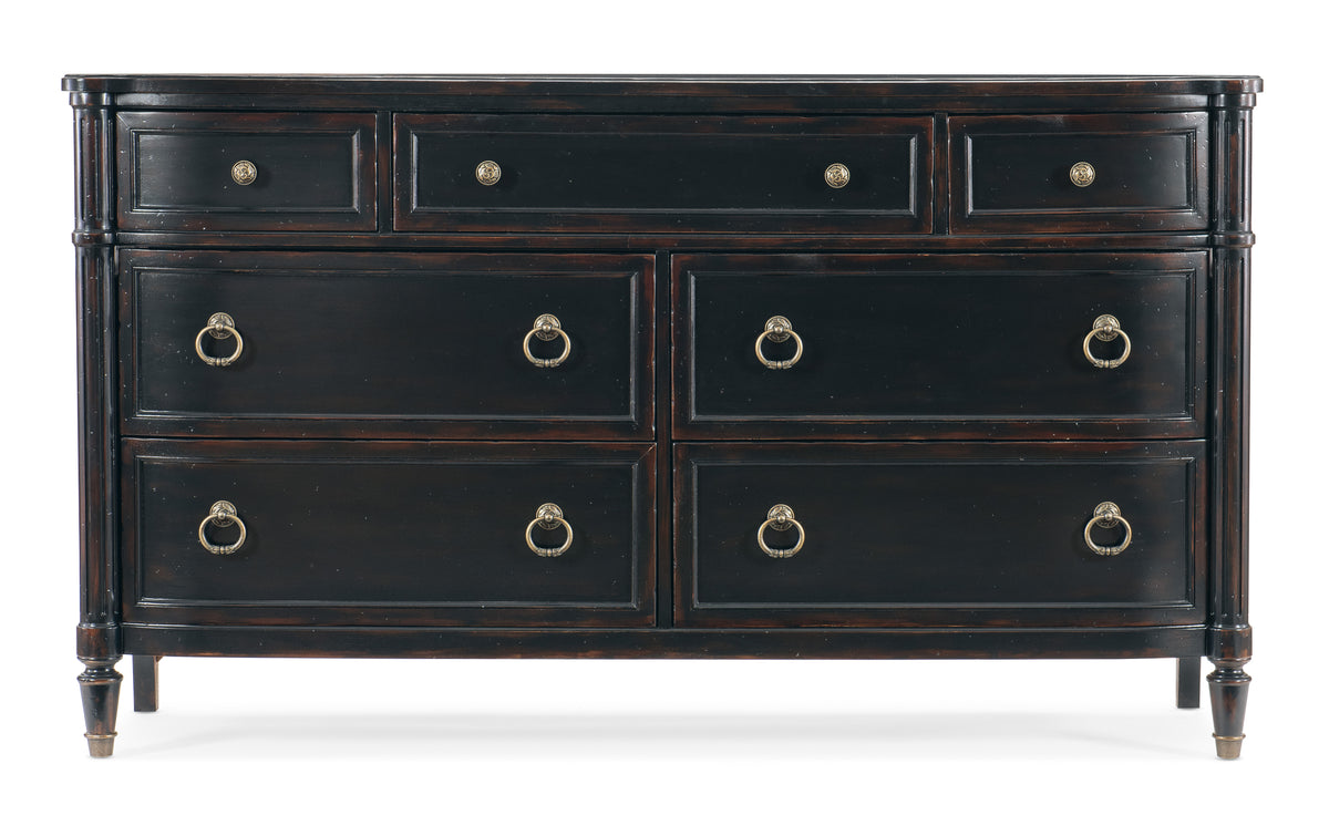 a black dresser with gold handles
