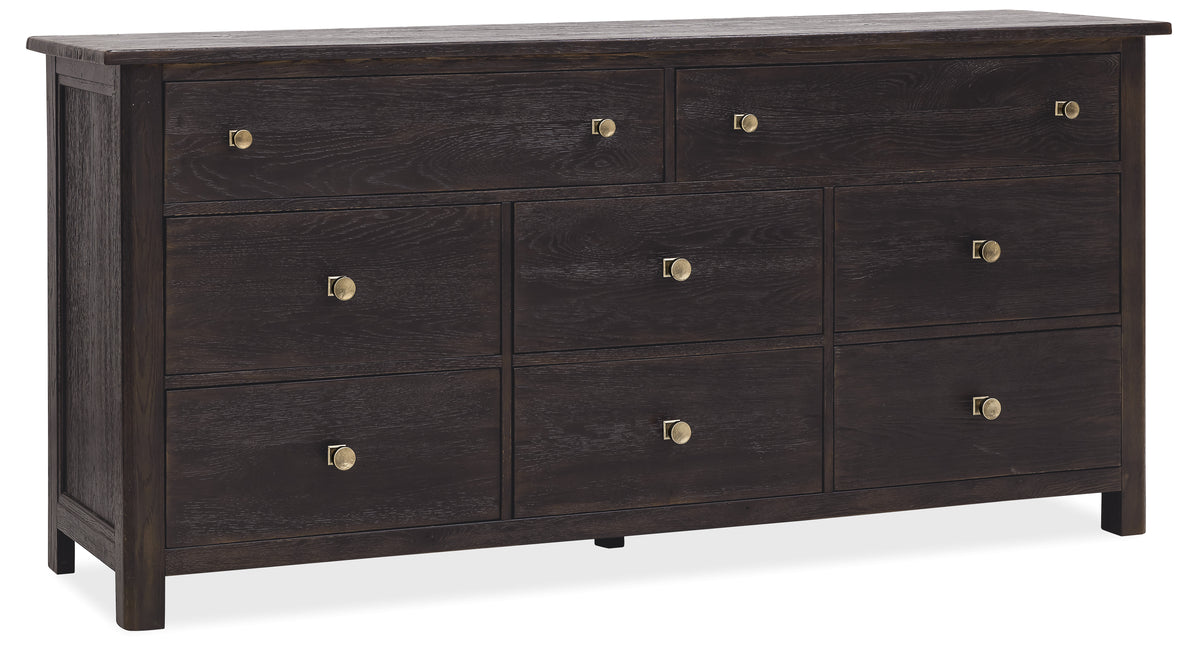 a black dresser with gold knobs