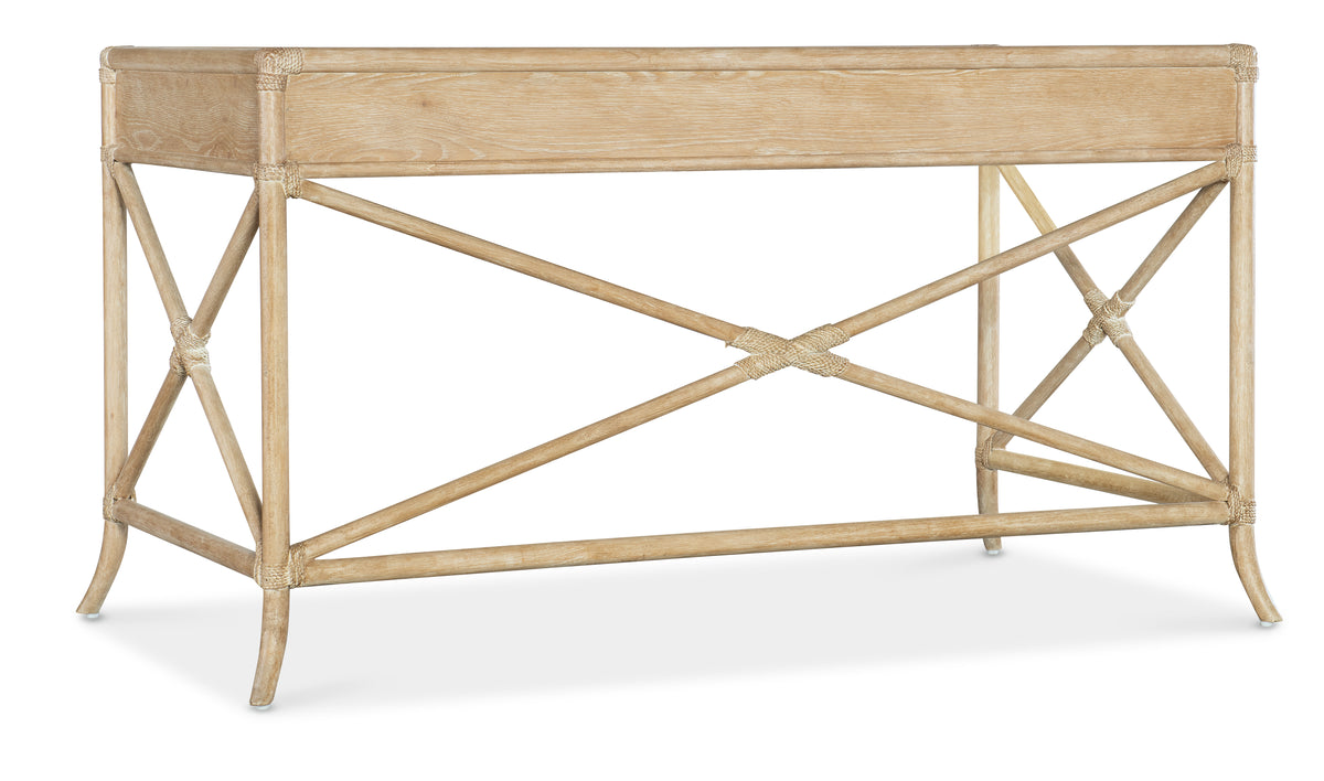 a wooden table with a cross-legged base